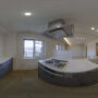a photograph of a kichen in equirectangular projection cropped for SNS